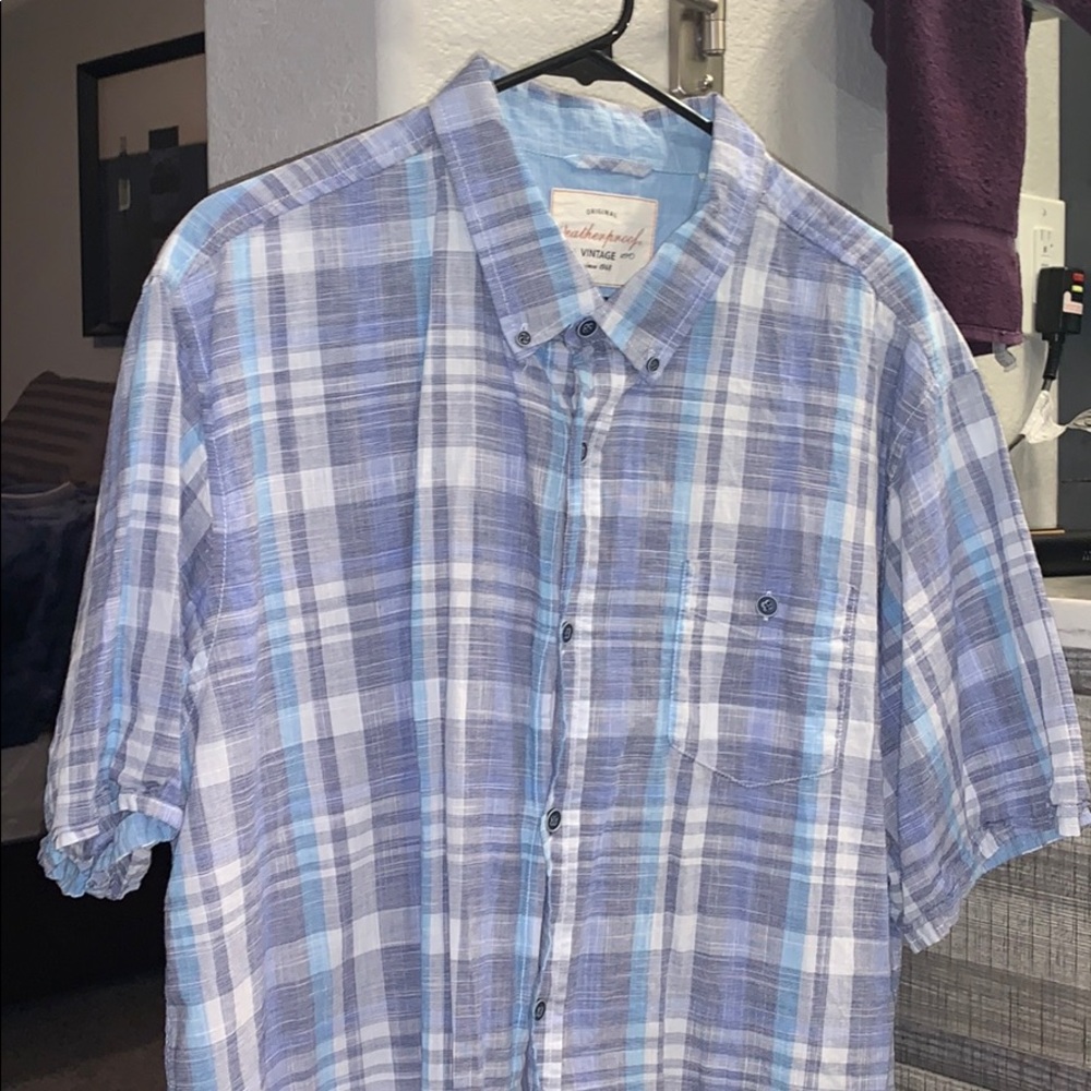 Business casual button up t-shirt.